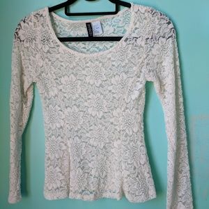 Laced long sleeve peplum top
